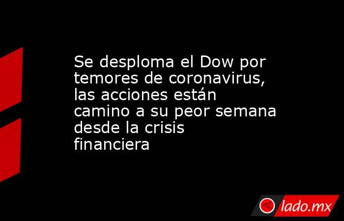 Se desploma el Dow por temores de coronavirus, las acciones están camino a su peor semana desde la crisis financiera. Noticias en tiempo real